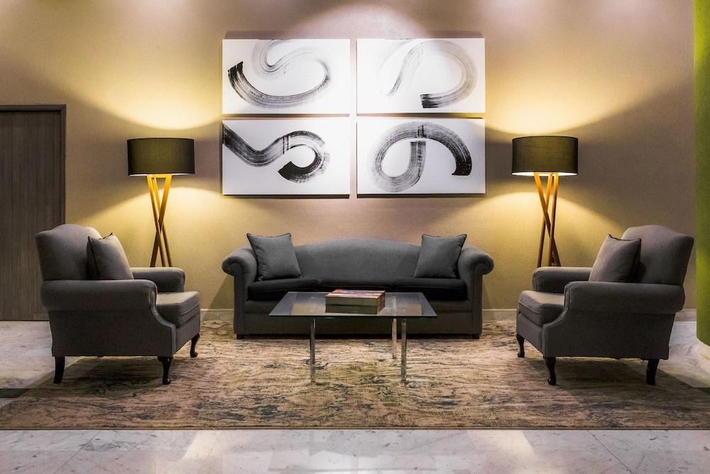 La Joya Pachuca Ξενοδοχείο Εξωτερικό φωτογραφία A living room with a carpet