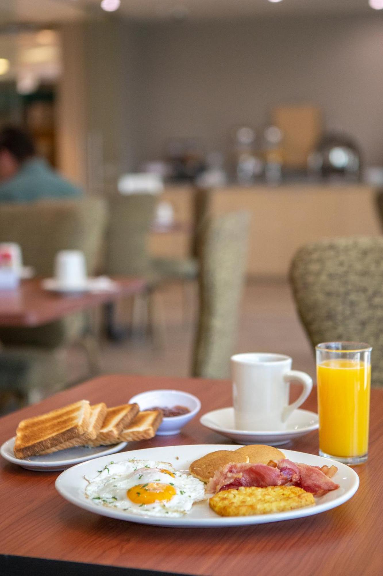 La Joya Pachuca Ξενοδοχείο Εξωτερικό φωτογραφία A breakfast with orange juice